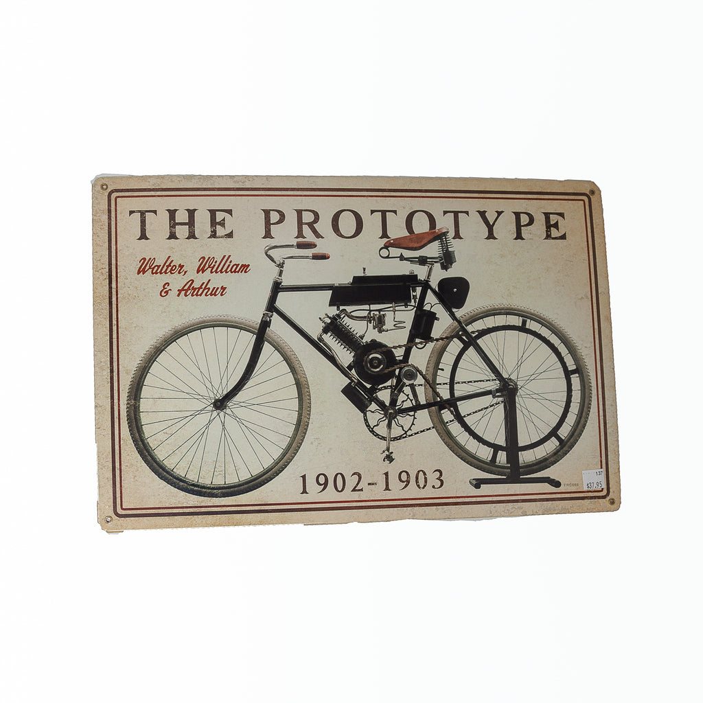 Dreamcycle Motorcycle Museum |  The Prototype metal sign on white background. 