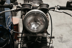 Front end photo of an old Motorcycle