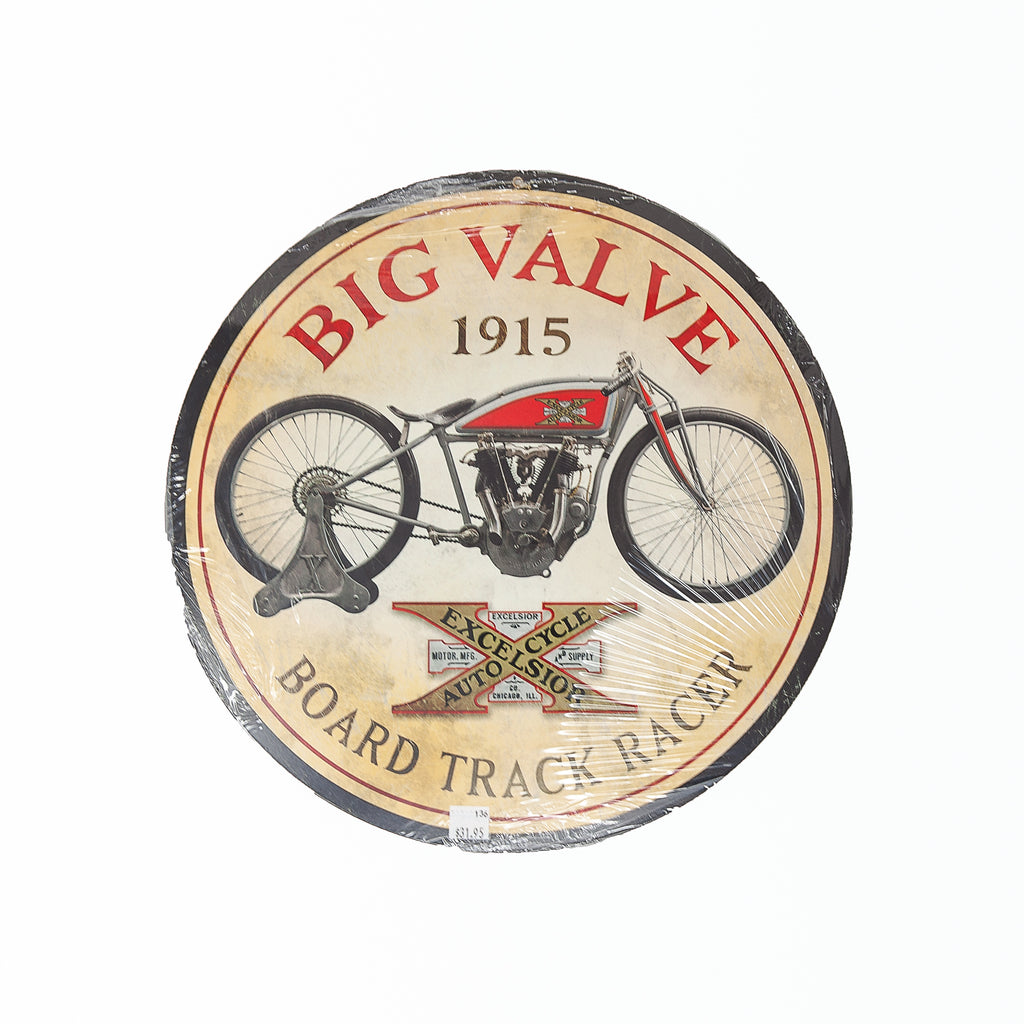 Dreamcycle Motorcycle Museum |  1915 Big Valve Board Track Racer Sign on white background. 
