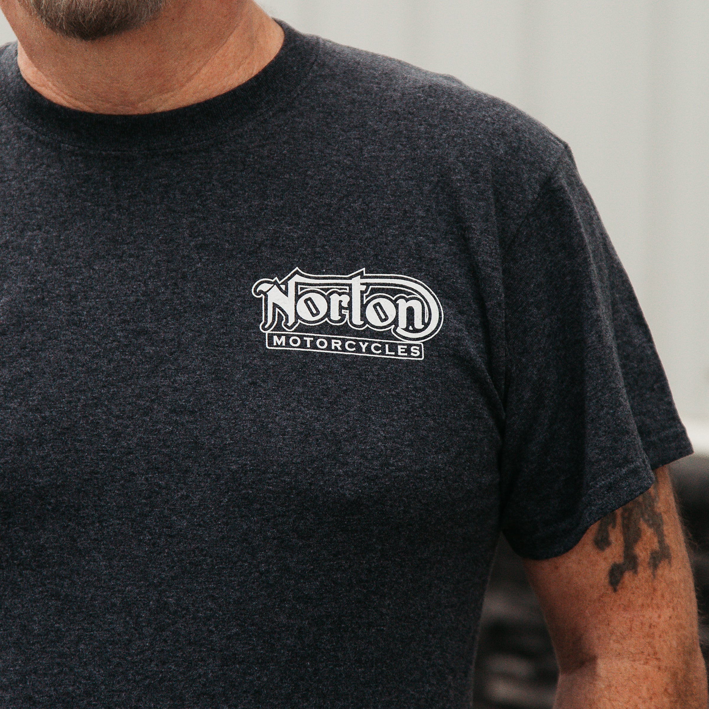 Dreamcycle Motorcycle Museum | Mens shoulder modelling norton motorcycles tshirt.