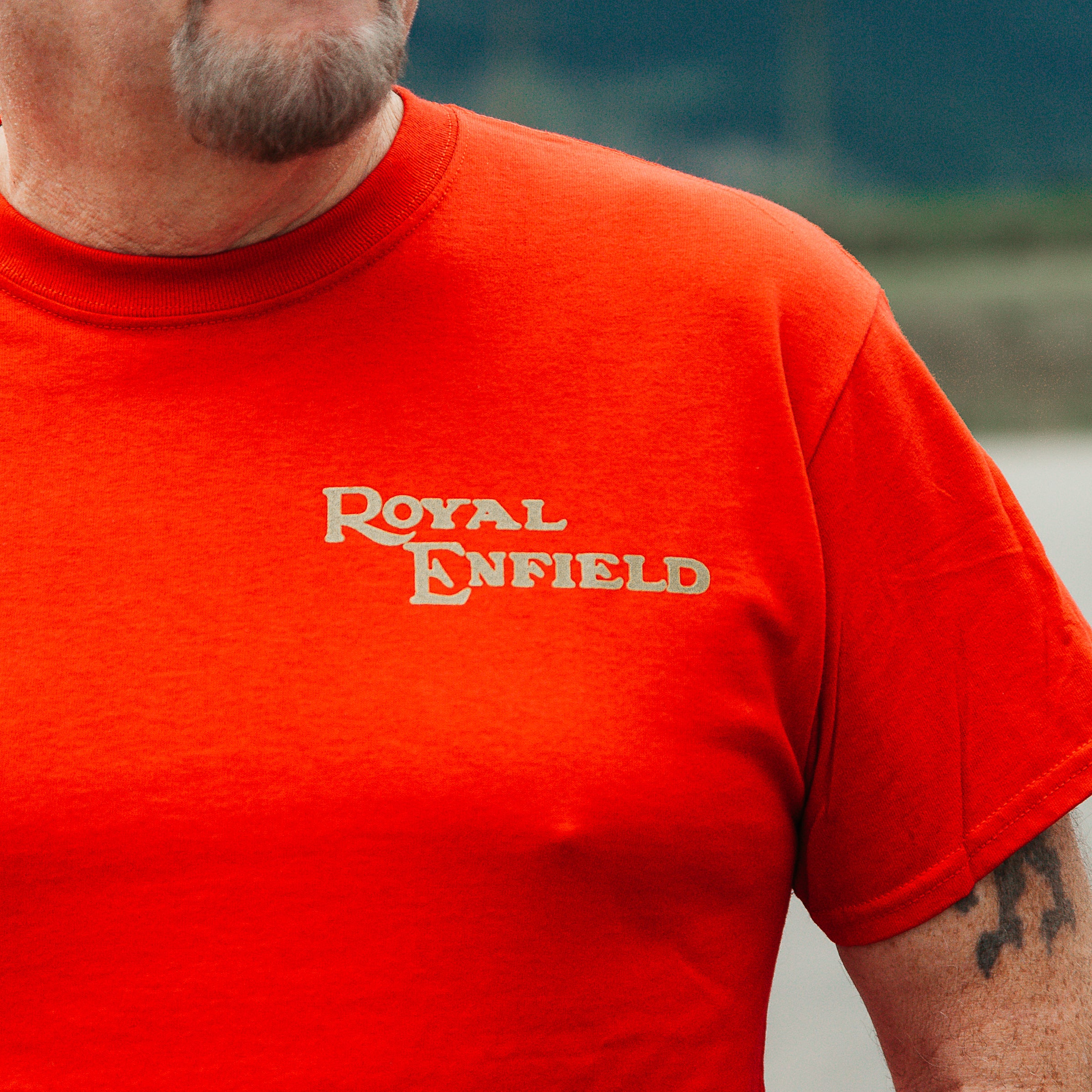 Dreamcycle Motorcycle Museum |  Models shoulder wearing royal enfield shirt in lifestyle setting.  