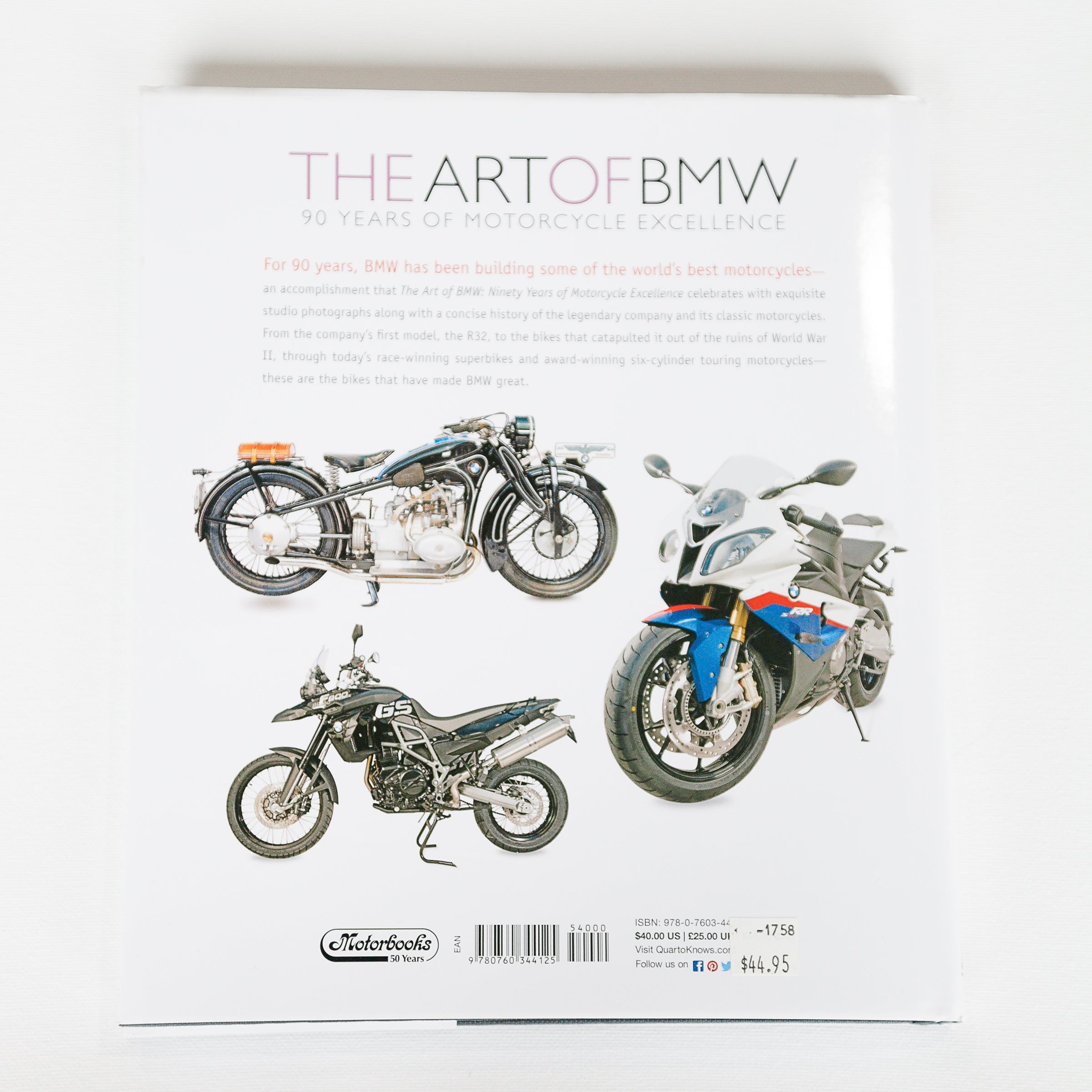 Dreamcycle Motorcycle Museum |  The art of BMW Back of book on white background. 