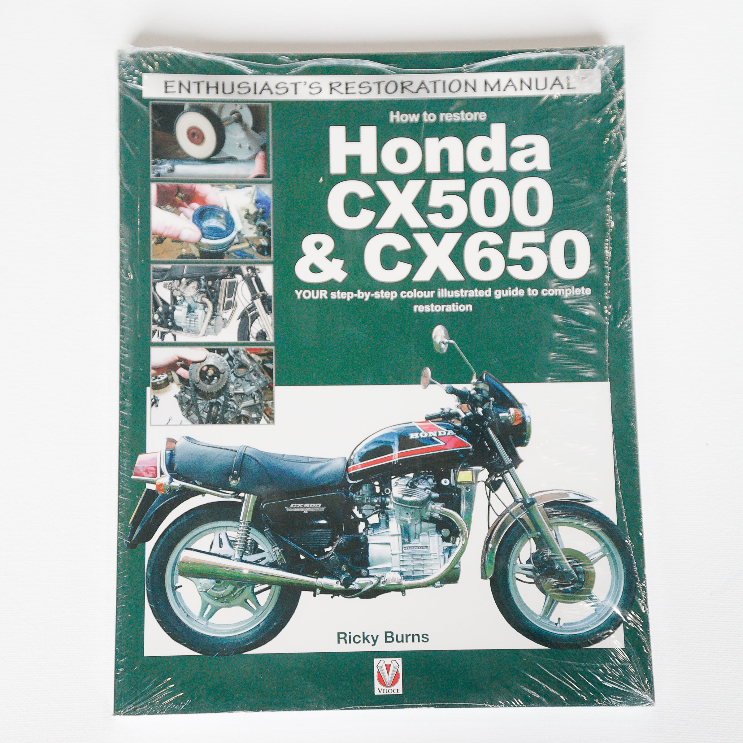 Dreamcycle Motorcycle Museum |  Honda restoration Manual on white background.