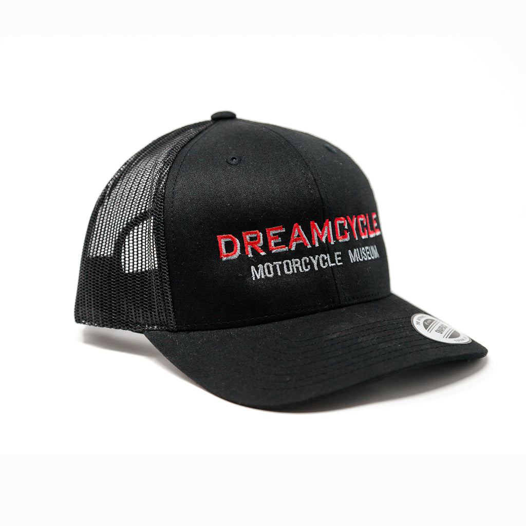 Dreamcycle Motorcycle Museum |  Black dreamcycle trucker hat on white background.