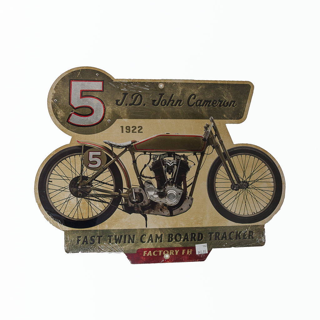 Dreamcycle Motorcycle Museum | John Cameron metal sign on white background. 